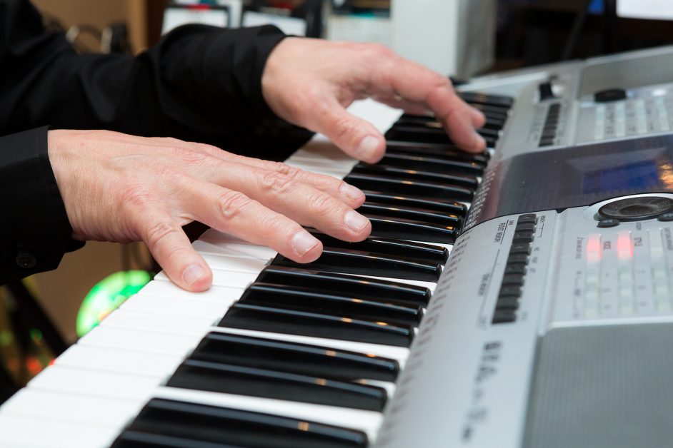 man playing keyboard