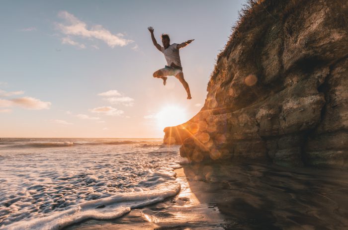 jumping into ocean